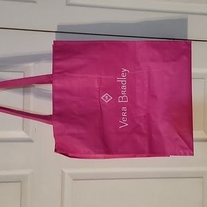Vera Bradley pink shopping bag.